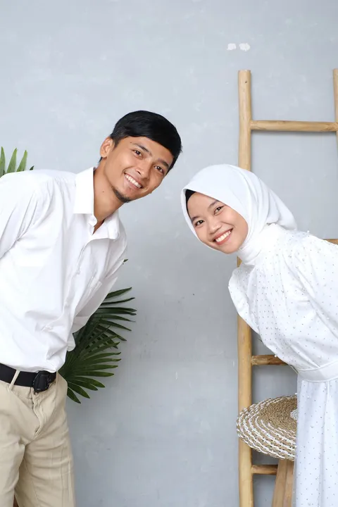 Foto sampul undangan Rury & Damas