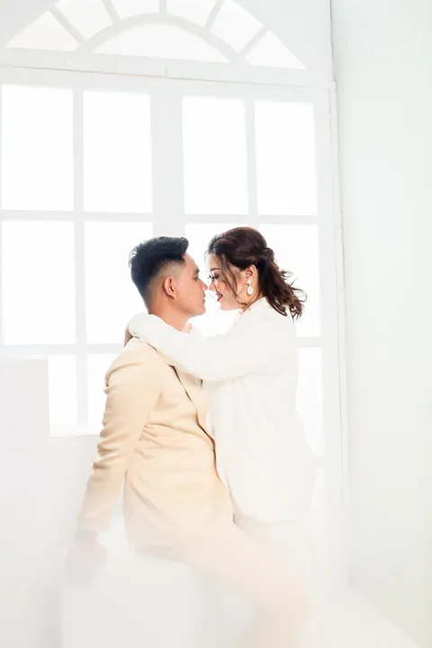 Foto sampul undangan Thania & Andrew