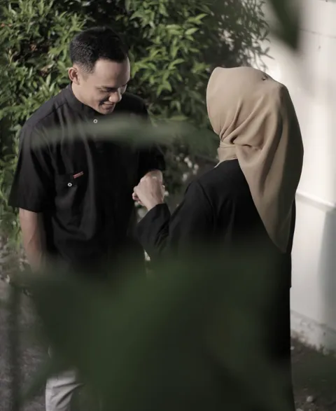 Foto sampul undangan Hendri & Della