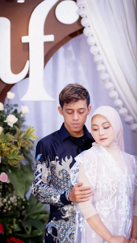 Foto sampul undangan Fahmi & Utari