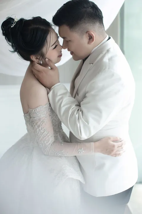 Foto sampul undangan Mega & Erick